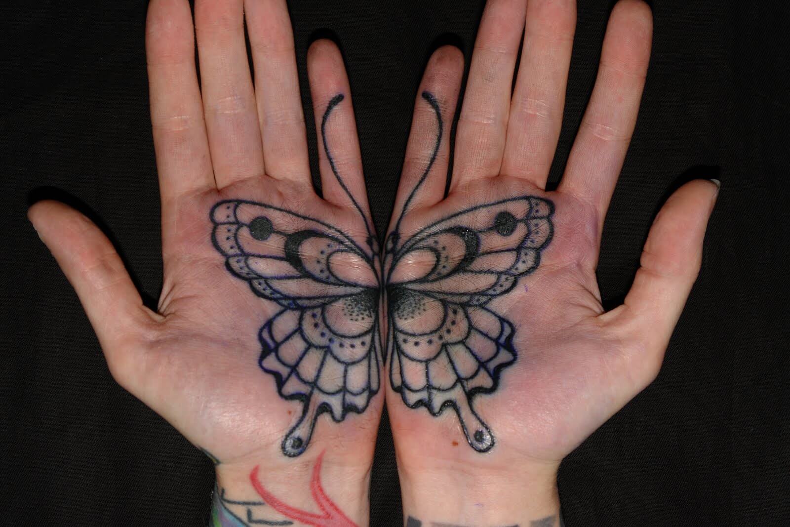 butterfly hand tattoo